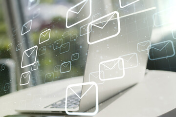 Creative abstract postal envelopes sketch on modern laptop background, e-mail and marketing concept. Double exposure