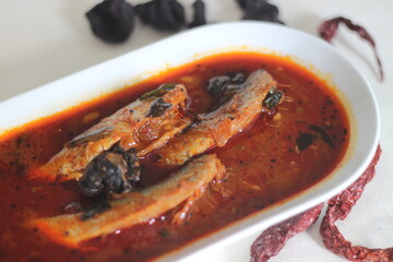 Sardines curry is a traditional central Kerala fish curry also known as mathi curry.