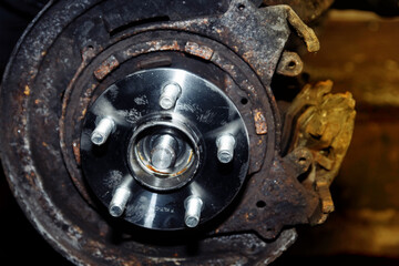 car wheel hub replacement in garage