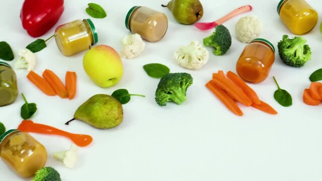 baby puree with vegetables and fruits. selective focus.