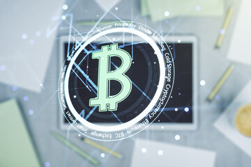 Creative Bitcoin concept and modern digital tablet on background, top view. Multiexposure