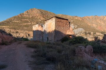Ruined and abandoned farmhouse on a mountain in southern Spain