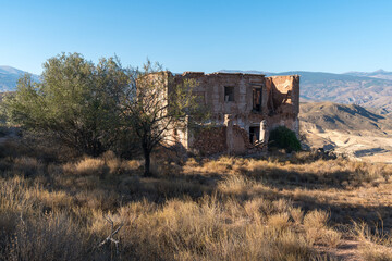 Ruined and abandoned farmhouse on a mountain in southern Spain