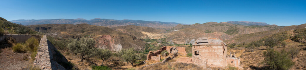 Fototapeta premium Ruined and abandoned farmhouse on a mountain in southern Spain