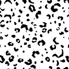 Abstract modern leopard seamless pattern. Animals trendy background. Black and white decorative vector illustration for print, card, postcard, fabric, textile. Modern ornament of stylized skin.