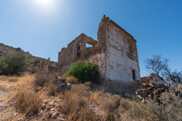 Fototapeta premium Ruined and abandoned farmhouse on a mountain in southern Spain