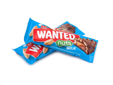 BUCHAREST, ROMANIA - FEBRUARY 12, 2020. Eti Wanted Nuts, peanut caramel nougat bars covered with milk chocolate, isolated on white
