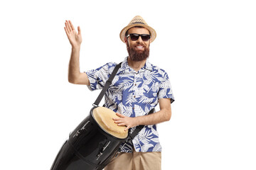 Fototapeta na wymiar Bearded male tourist playing conga drums