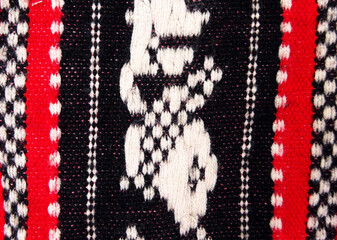 knitted woolen fabric with red and white stripes