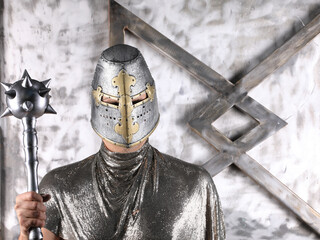 portrait of a medieval knight in a helmet and armor