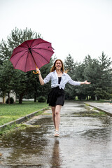 girl with umbrella in the rain