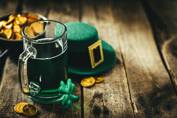 St. Patricks day concept - green beer and symbols, rustic background. Part invitation. - obrazy, fototapety, plakaty