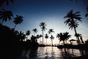 Fototapeta na wymiar Amazing twilight on a asian tropical sea beach.