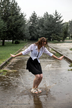 Girl Dancing In The Rain