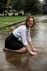 girl dancing in the rain