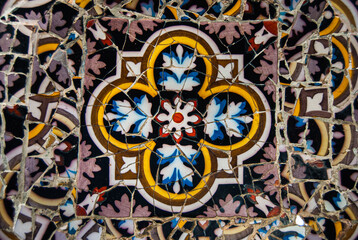 Mosaic made with colorful tiles with flower shapes