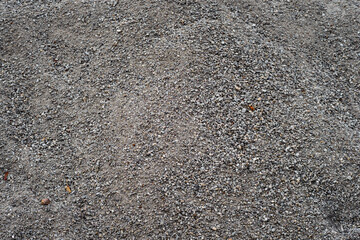 Heap of gray gravel outdoors.