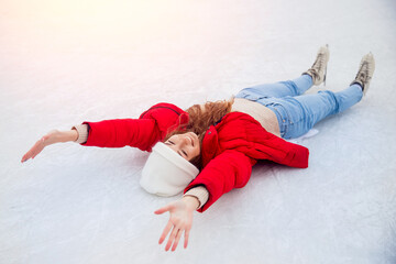 Woman prepared on skates before skating on ice rink, top view