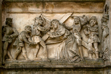 Fototapeta na wymiar BAS-RELIEFS IN ARCHITECTURE. Bas-relief featuring with scenes from the Bible. Bamberg. Germany. Europe. European travel.