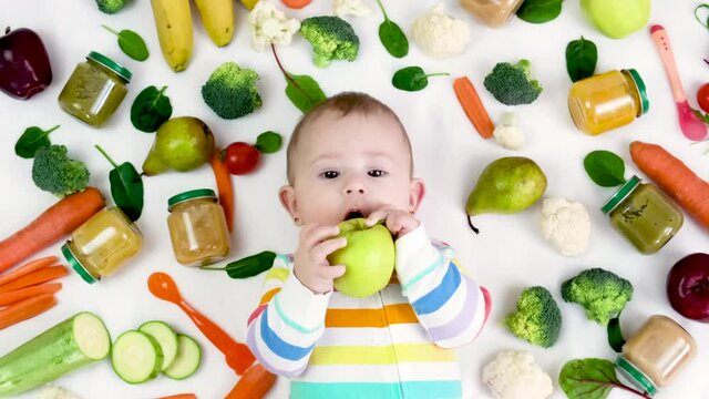 baby puree with vegetables and fruits. selective focus.