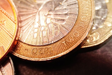 Closeup macro of Sterling two pound coins.