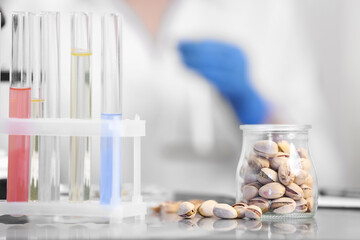 Pistachios on table in laboratory. Food quality control