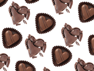 Set with delicious heart shaped chocolate candies on white background, top view