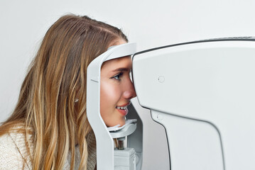 The doctor checks the patient's throat. Consultant in the ophthalmology office. Apparatus for...