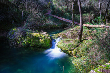 River waterfall with silky water in the little village of Beselga, Portugal