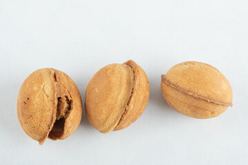 Walnut sweet cookies on a white background