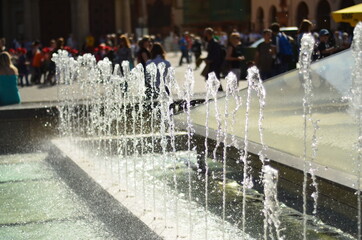 Fountain in Old Town Cracow. A touristic place in Poland