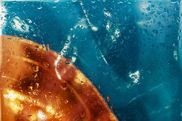 Scenic illuminated bright background with drops of water, bright colors. Abstract cosmic space