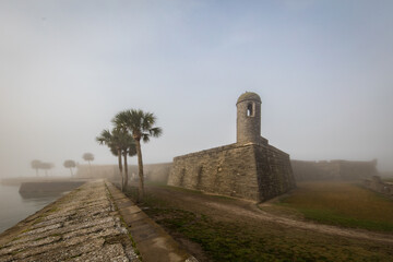 Obraz na płótnie Canvas Watchtower at the historic Castillo de San Marcos National Monument in the morning fog.