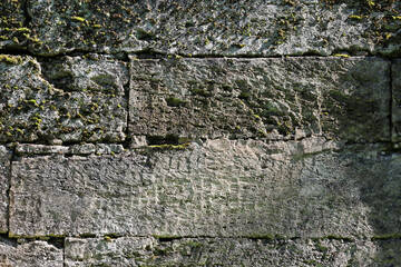 background from ancient stone. ancient wall that separates two parts of the park from each other. Eighteenth century. Stone and history