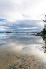Brittany, Ile aux Moines island in the Morbihan gulf, the church and the Port-Miquel beach, beautiful light
