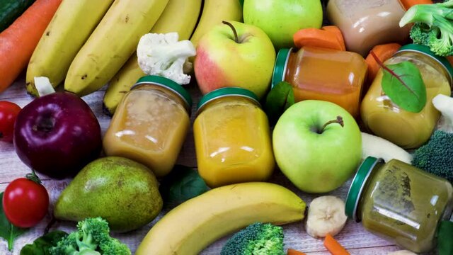 baby puree with vegetables and fruits. selective focus.