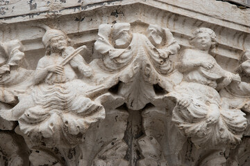 Doge's Palace in Venice, architectural detail capital, Italy, Europe.