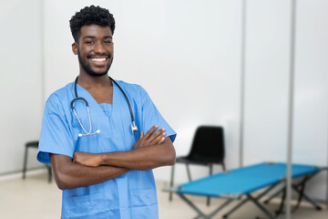Handsome african male nurse at vaccination station