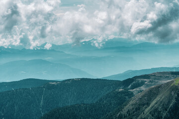 panoramic view of the Dolomites with beautiful weather clouds , Italy.