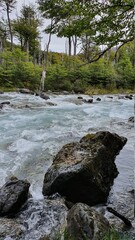 View of waterfall with lagoon