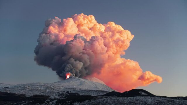 time lapse volcanic eruption in Sicily from Etna Volcano  north-east crater, the raising of a column of smoke accompanied by explosions of lava - 16 february 2021