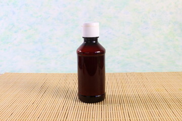isolated liquid syrup bottle for health,medicine,pharmacy,cosmetic,beauty,aroma,liquid,oil related concept