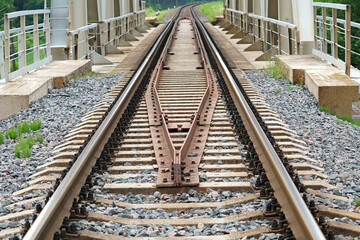 Fototapeta na wymiar guard rails or check rails on the railway bridge 