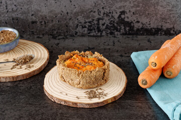 Pie with carrot and potato filling with caraway seeds. Rye flour homemade pastry.