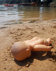Tragedy of a doll in the sea