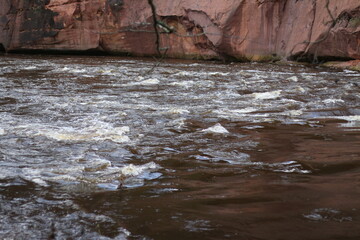 water flowing into the river