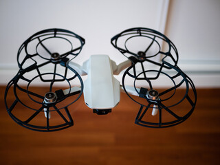 Selective focus of a drone with propeller guard flying indoors