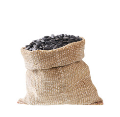 sunflowers seeds in a sack isolated on a white background with clipping path.