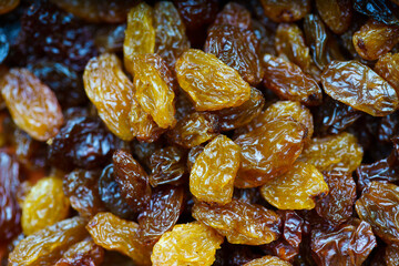 Close-up of a bunch of raisins, with out of focus background.