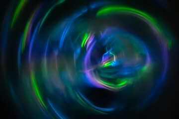 Yoga meditation in lotus pose with aura spiritual. Abstract blurred background